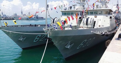 Two KCR-60M vessels, KRI 
        
         and KRI 
        
        , at the IMDEX 2019 exhibition. 
        
         is undergoing an installation process for the A-220M 57 mm naval gun.