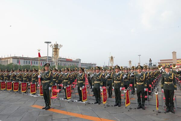 Members of a Chinese military orchestra parade on Tiananmen Square before a celebration marking the 100th founding anniversary of the Communist Party of China (CPC) on 1 July 2021 in Beijing, China. The CPC has encouraged the integration of wargaming within Chinese military planning since 2017. (Lintao Zhang/Getty Images)