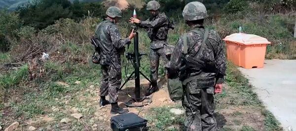 A screengrab from footage provided by DAPA showing soldiers using South Korea's upgraded 81 mm mortar system. (DAPA)