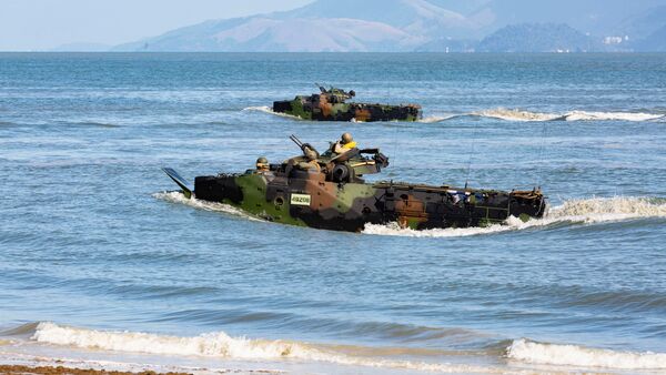 The US Marine Corps AAV7 amphibious assault vehicles conduct ship-to-shore operations during a simulated disaster relief situation during UNITAS LX at Ilha da Marambia, Brazil in August 2019. US Army Lieutenant General Laura Richardson has vowed to continue partnership building with countries throughout Latin America if she is confirmed as the next US Southern Command commander. (US Marine Corps/Cpl Mathew Rosado)