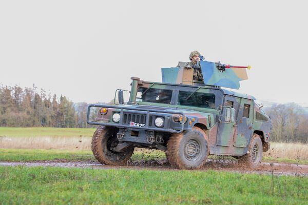 Luxembourg approved a draft law on the procurement of 80 new CLTVs on 2 June to replace its 42 up-armoured Humvees (pictured) and 48 protected reconnaissance vehicles. (Luxembourg Army)