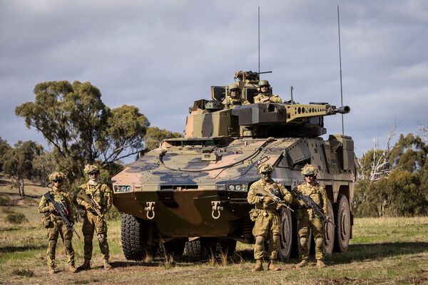 Australian Army soldiers with a Boxer CRV during Exercise ‘Chong Ju' in May 2018. The DoD in Canberra has rejected claims of a weight problem that could affect the successful integration of the Lance turrets contracted for 133 of the 211 being acquired for the Australian Army. (Commonwealth of Australia/Australian Department of Defence)