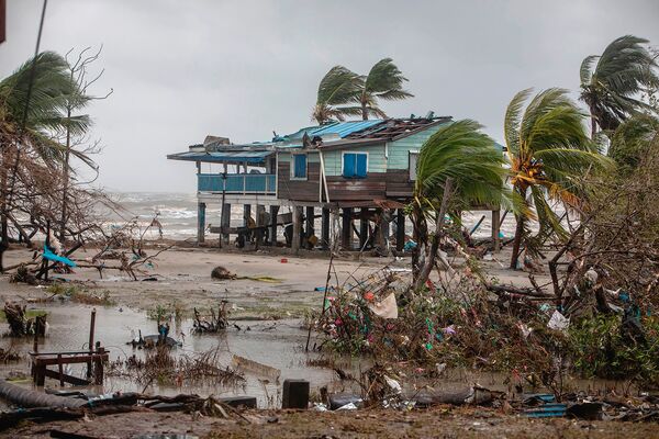 A destroyed house is pictured after the passage of Hurricane Iota in Bilwi, Nicaragua, on 17 November 2020. According to the US National Oceanic and Atmospheric Administration, 2020 was a record year for ‘named storms'.  (AFP via Getty Images)
