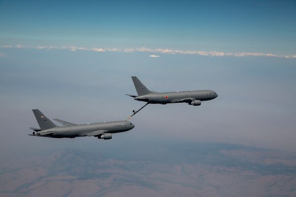 The first of four KC-46A tankers bound for the JASDF is seen here refuelling another KC-46A in the skies over the US state of Washington on 9 August. (Kevin Flynn via Boeing)