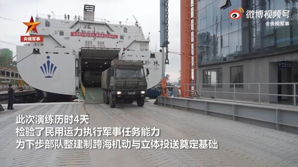 
        A screengrab from footage released by CCTV on 17 August showing a military truck belonging to an amphibious brigade under the PLAGF's 73rd Group Army rolling off the ramp of the 
        Bohai Zhen Zhu 
        commercial ferry commercial ferry as part of a training exercise.
       (CCTV)