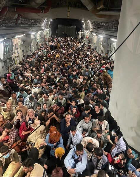 A USAF Boeing C-17 Globemaster III safely transported 823 Afghan citizens from Hamid Karzai International Airport in Kabul on 15 August. US Air Mobility Command said that this is a record for the C-17. (USAF)