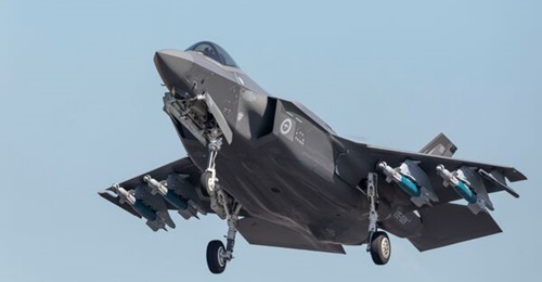 An RAAF F-35A fighter aircraft takes off from RAAF Base Darwin with its payload of GBU-12 bombs during Exercise 'Arnhem Thunder 21'. This is the first time Australian F-35As have carried a full load of internal and external weapons.