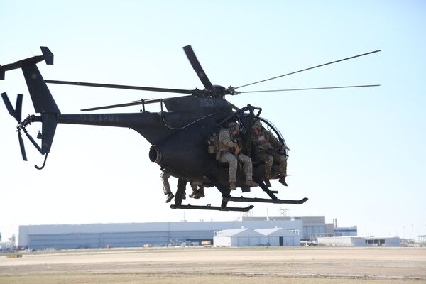 Operators from US Army's 10th Special Forces Group conduct aviation insertion training with an AH-6 Little Bird at Fort Carson, Colorado. (DVIDS)