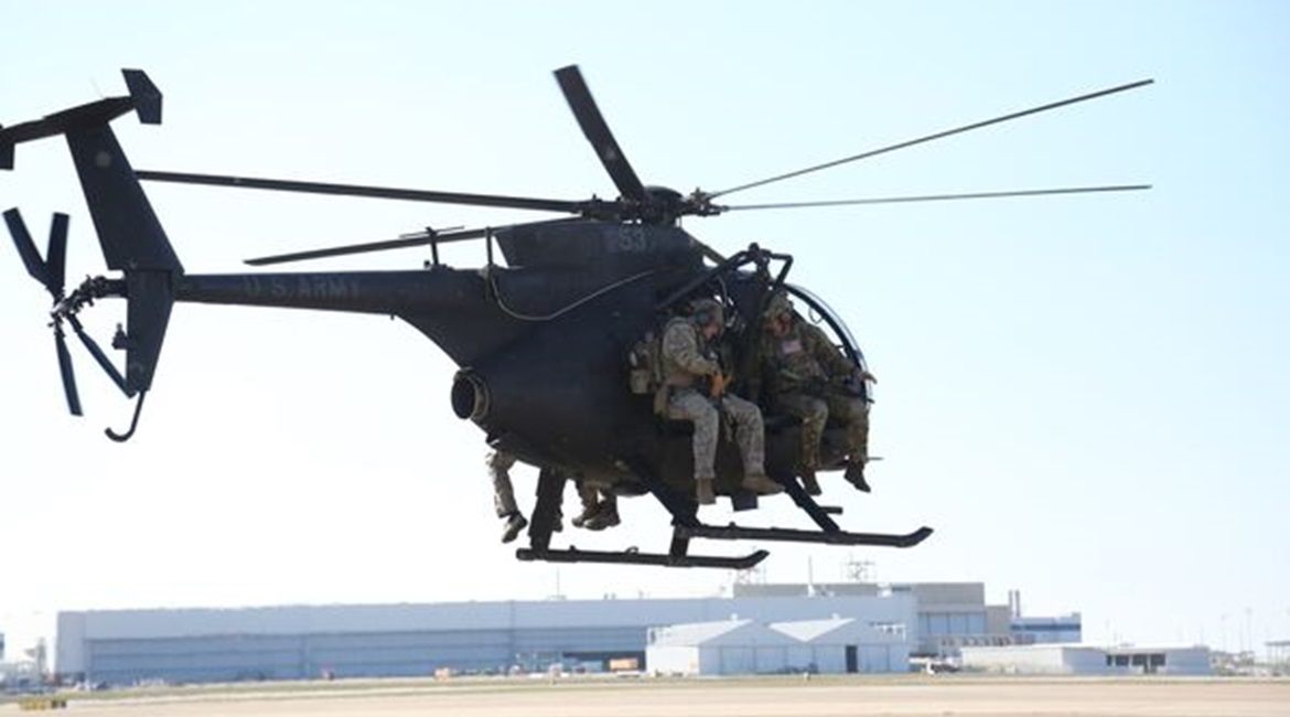 Operators from US Army's 10th Special Forces Group conduct aviation insertion training with an AH-6 Little Bird at Fort Carson, Colorado.
