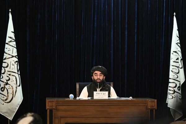 Taliban spokesperson Zabihullah Mujahid during a press conference held in Kabul on 7 September in which he announced that Mullah Mohammad Hassan Akhund would be the head of a new Taliban interim government in Afghanistan, while other key positions would go to some of the group's top officials. (Aamir Qureshi/AFP via Getty Images)
