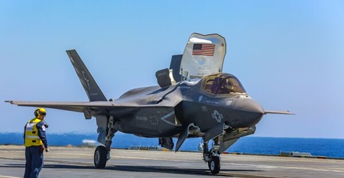 A F-35B accelerates on the ski ramp aboard HMS 
        
         on 8 June. Difficulty sustaining the F-35's engine is contributing to a higher cost per flying hour than originally anticipated, according to a former programme official and a g...
