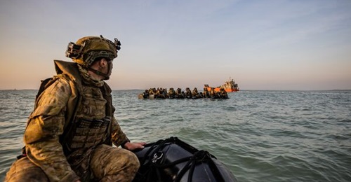 Australian Army soldiers from the 1st Brigade and the Armed Forces of the Philippines travel by Zodiac small craft from Darwin to Channel Island, Northern Territory, to conduct an assault as part of Exercise Predator's Run 2023.