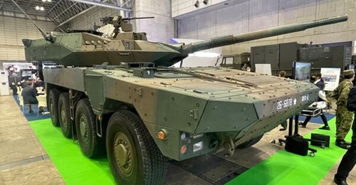 Japan's new defence industry law aims to strengthen the capability of local firms to design, develop, and produce military equipment such as this Type 16 Mobile Combat Vehicle (displayed at the DSEI Japan 2023 exhibition in Chiba) built by Mitsubishi H...