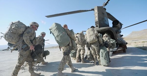 US soldiers boarding a Chinook helicopter in the Gardez district of Afghanistan's Paktia Province in 2011. USCENTCOM announced on 15 June that the Pentagon has already completed more than 50% of the military retrograde process in Afghanistan.