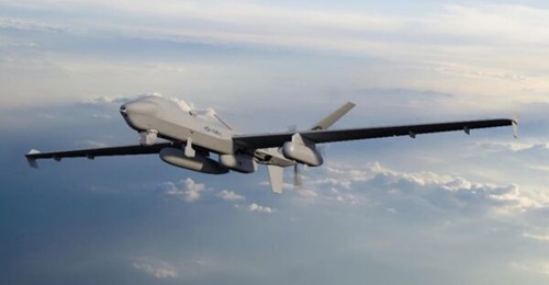 One of the two MQ-9A Block 5-15 air vehicles currently operating with Marine Unmanned Aerial Vehicle Squadron 1 (VMU-1). The accompanying artist's rendering shows an MQ-9A Block 5-25 in VMU-1 colours. The SkyTower ANE pod is carried beneath the MQ-9A's...