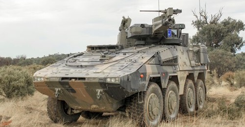 Iron Fist Light Decoupled system mounted on the Lance turret of the 8×8 Rheinmetall Boxer Combat Reconnaissance Vehicle.