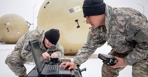US soldiers carry out the Warfighter Information Network-Tactical Transportable Tactical Command Communications operational test at Joint Base Elmendorf-Richardson, Alaska.