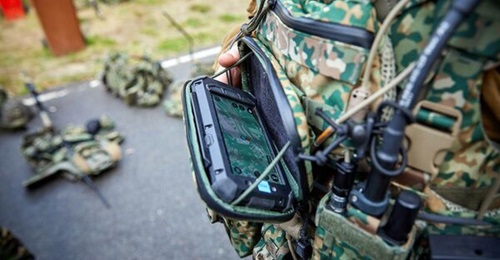 The Royal Netherlands Army's VOSS soldier system incorporates a vest, backpack, E-Lynx PNR-1000 radio, and the Raptor end-user device. It is designed for mounted and/or platoon-level infantrymen.