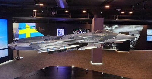 A model of the Gripen E combat aircraft at Saab's headquarters in Stockholm. With the type set to be in Swedish Air Force service through into the 2040s, the country is now looking at what might come after.