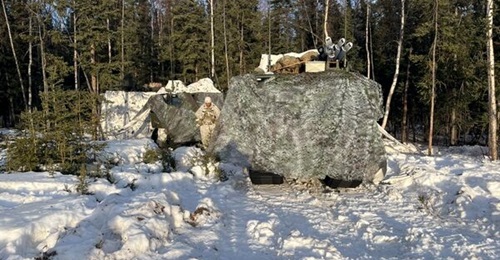 A convoy of Cold Weather All-Terrain Vehicles perform command-and-control operations for the Joint Pacific Multinational Readiness Center training rotation in Fort Greely, Alaska.