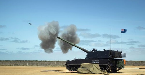An Australian Army AS9 Huntsman self-propelled howitzer test-fires a practice round at the Proof and Experimental Establishment in Port Wakefield.