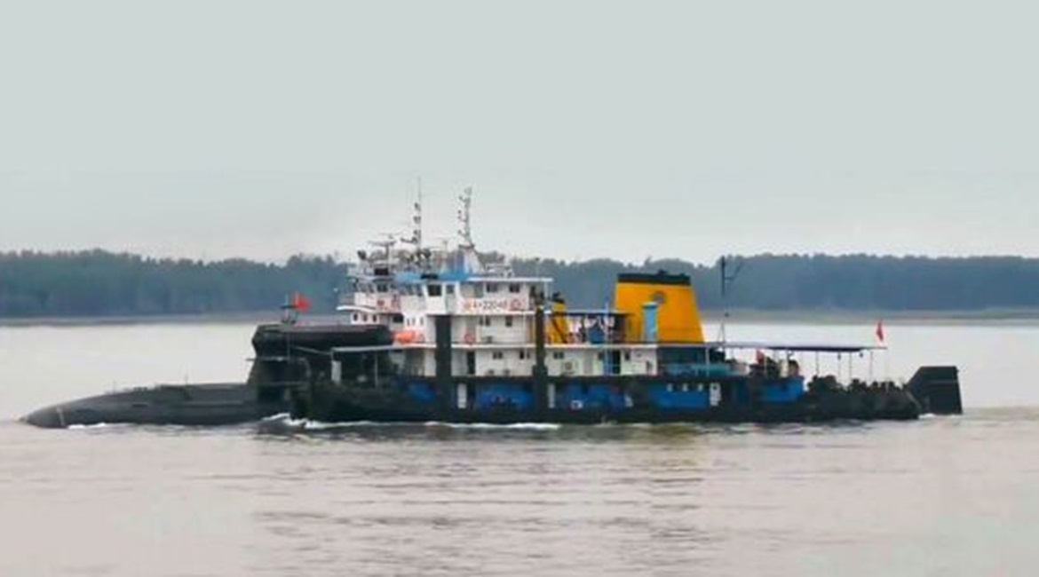 A composite image produced from multiple screengrabs taken from video footage posted on the TikTok social media platform in about mid-June showing a new conventionally powered submarine for the Chinese navy.