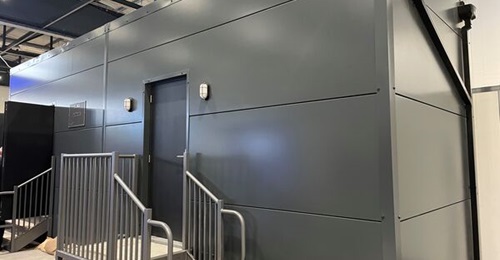 The Babcock Immersive Training Experience (BITE), unveiled at IT²EC 2024, was configured to imitate a bunker control room, equipped with communication devices and video feeds, including from UAVs and social media.