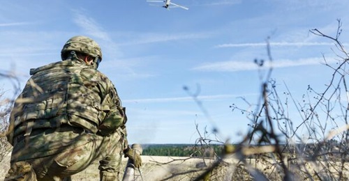 A US Army soldier launched an AeroVironment Switchblade. The loitering munition is the only system publicly identified as being selected to be part of the Replicator initiative.