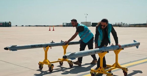 A still from a video released by Baykar shows the TV- and laser-guided IHA-122 air-to-surface missiles that were loaded on an Akinci for the test.