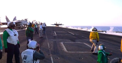 US Navy officials say operations conducted aboard aircraft carrier USS 
        
         in the Red Sea can be employed in the Western Pacific.