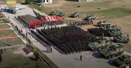 A still from Chinese news coverage of Exercise 'Peace Unity 2024' shows the Tanzanian and Chinese contingents formed up at the Comprehensive Training Centre, Mapinga, for the opening ceremony.