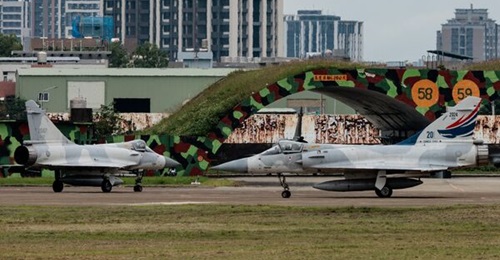 Two Republic of China Air Force Dassault Mirage 2000-5Ei fighter aircraft at Hsinchu Air Base in northwestern Taiwan on 23 May 2024. The Mirage that crashed on 10 September 2024 is the aircraft on the left (with serial number 2047).