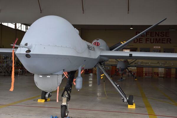 Two of the six Reaper Block 5 UAVs delivered to the French Air Force in 2020, seen at Cognac airbase on 17 June. Another three operate in Niger, while the sixth is flying in weapons qualification tests in the US. (Jean-Marc Tanguy)