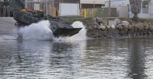 US Marines with Amphibious Vehicle Test Branch, Marine Corps Tactical Systems Support Activity, take an ACV out for open ocean low-light testing in December 2019. The service announced that it had paused ACV waterborne operations in September 2021 due ...