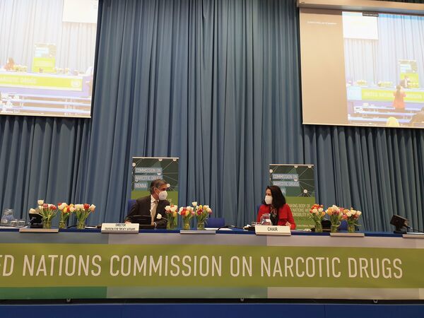 Director of the UNODC Division for Treaty Affairs John Brandolino (left) and CND Chair Dominika Koris (right) attend the 64th UN Commission on Narcotic Drugs in Vienna on 14 April 2021. The UN's CND remains profoundly split over issues of drug control. (UNODC)