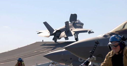 An F-35B launches from the deck of HMS Queen Elizabeth on the ship's first operational use of its embarked air power.