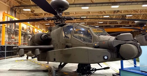 A British Army AH-64E Apache attack helicopter seen during a media event at Wattisham Flying Station. The UK has now formally received all 50 helicopters.