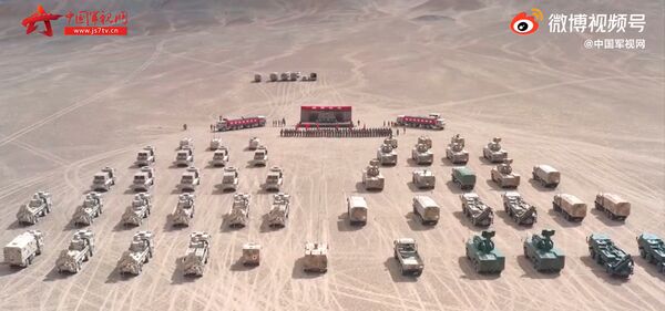 A screengrab from footage released by CCTV on 25 May showing that new wheeled artillery and air-defence assets have entered service with a combined arms formation under the PLAGF's Xinjiang Military Command. (CCTV)