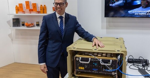 Australia's Minister for Defence Industry Pat Conroy with a QuantX Labs quantum clock at the Indo Pacific International Maritime Exposition 2025 in Sydney held from 4 to 6 November.