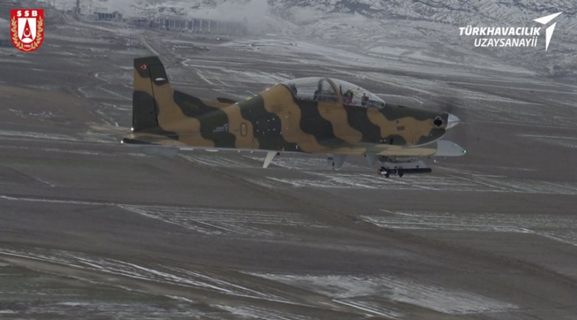 An example of Turkey's locally developed Hurkus-C basic trainer/light attack aircraft, carrying weaponry and defensive systems to facilitate close air support missions, has successfully completed flight and firing trials.