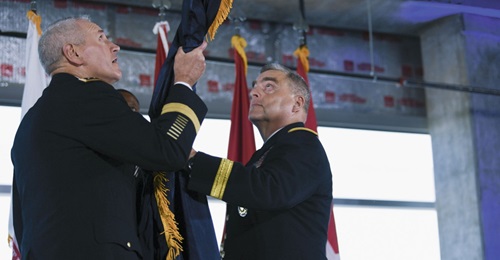 US Army General Mike Murray, commander of Army Futures Command, and Chief of Staff of the Army General Mark Milley unfurl the Army Futures Command flag during a ceremony last August. Gen Milley has been nominated to be the next chairman of the Joint Ch...