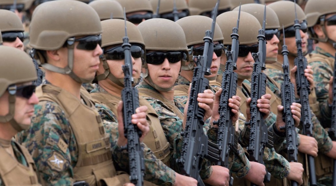 Chilean troops on parade in Santiago for Chile's 208th independence anniversary on 19 September 2018. A Chilean initiative to reduce pension costs by extending military service terms could save USD500 million over the next 30 years.
