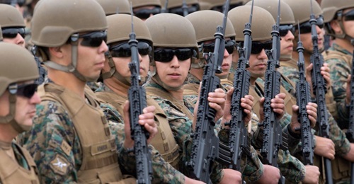 Chilean troops on parade in Santiago for Chile's 208th independence anniversary on 19 September 2018. A Chilean initiative to reduce pension costs by extending military service terms could save USD500 million over the next 30 years.