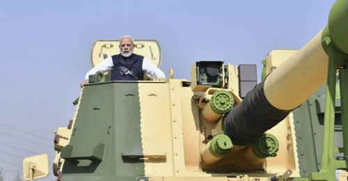 Indian Prime Minister Narendra Modi on a locally built K-9 Vajra SPH at L&T's Armoured Systems Complex in Hazira, Gujarat, on 19 January. Modi inaugurated the facility that same day.