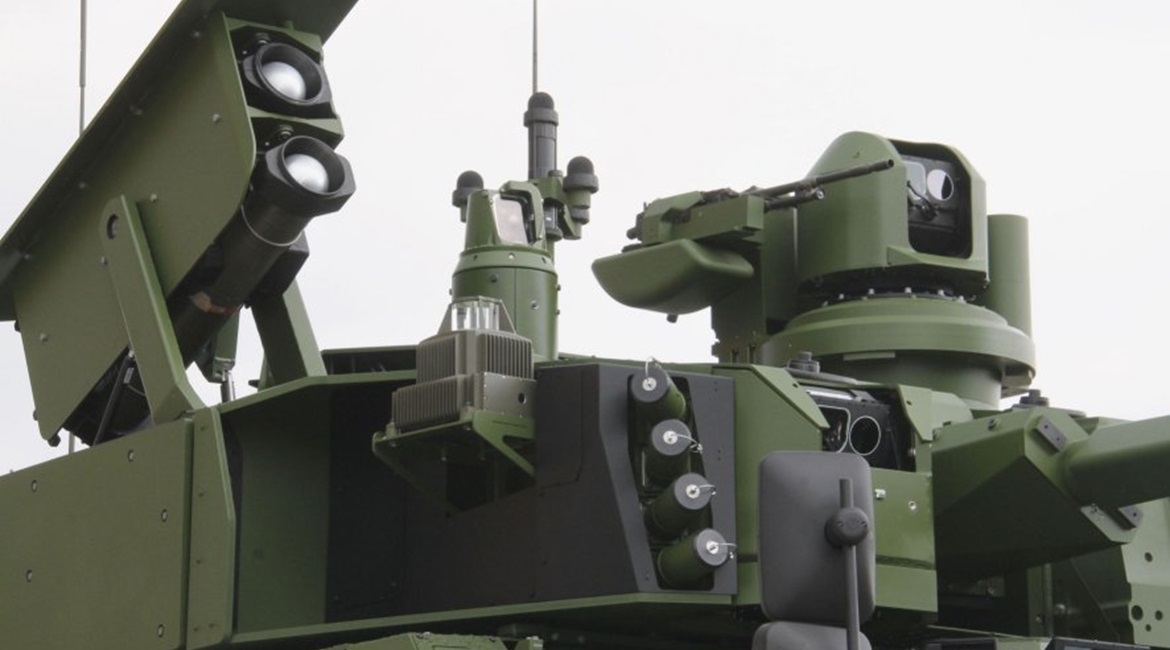 The Jaguar 6×6 showing the Hornet S RWS with the Safran sighting system and a 7.62 mm MG. On the left is the pod of two MBDA MMP anti-tank guided missiles.