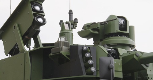 The Jaguar 6×6 showing the Hornet S RWS with the Safran sighting system and a 7.62 mm MG. On the left is the pod of two MBDA MMP anti-tank guided missiles.