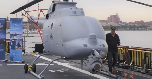 The MQ-8 Fire Scout is integral to USN airborne countermine mission packages.