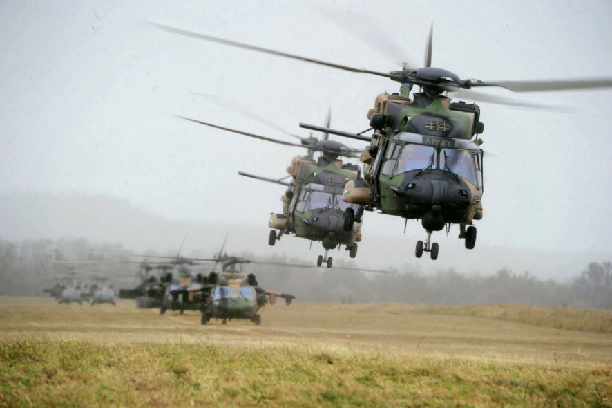 Australia will transition its special forces helicopter capability from the Black Hawk (background) to the MRH90 (foreground) by the end of November 2021. (Australian DoD)
