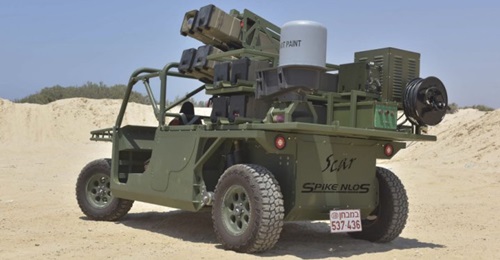 An eight-round Spike NLOS missile launcher is seen mounted on a Tomcar TE.