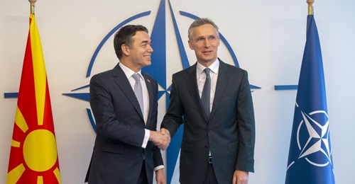 The accession protocol for Macedonian membership in NATO was signed on 6 February in the presence of the country's foreign minister, Nikola Dimitrov (left, shaking hands with Secretary General Jens  Stoltenberg).